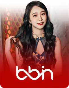 BBIN female live dealer with long black hair in an elegant floral dress, seated in a warm-toned studio with red branding
